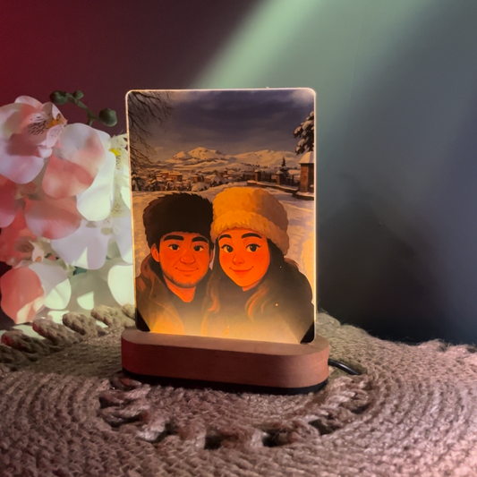 Custom animated photo night light glowing on a wooden LED base
