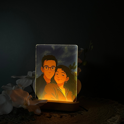 Custom animated photo night light glowing on a wooden LED base